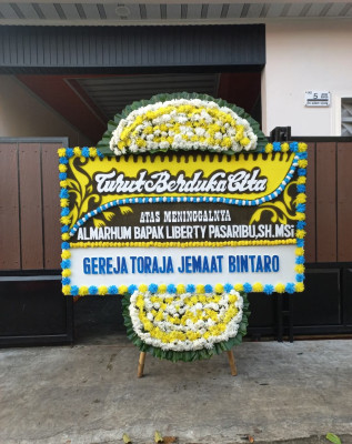 Papan Bunga Duka di Bonan Dolok